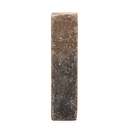 Single Aldridge clay paver, standing on one end, revolves anti-clockwise to show different faces and tumbled edges.