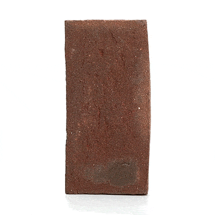 Single Dorset Antique clay brick paver standing upright and revolving to show texture and shape. Free UK delivery available.