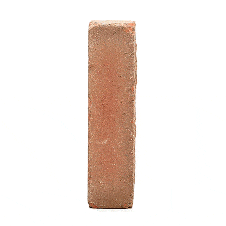 Single orangey-red Seville clay brick paver standing upright and revolving. Free UK delivery available.