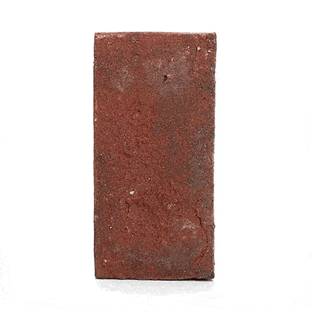 Single Old English clay paver standing upright and revolving, showing wide shape and red colour.  Free UK delivery available.