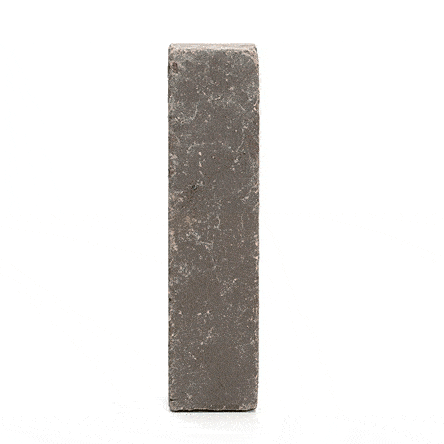 Single Moderna clay paver standing upright and revolving to show smooth and sanded faces. Free UK delivery available.