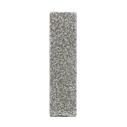 Single Antique Grey limestone patio brick standing upright and revolving. Free UK delivery available.
