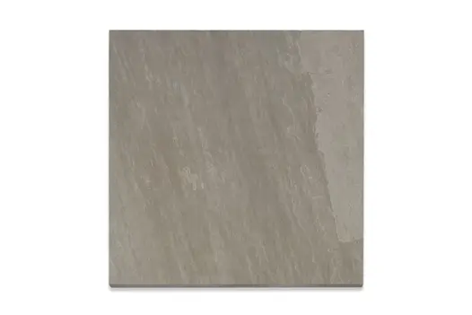 Single Kandla Grey 16mm porcelain paving slab, viewed from above, showing texture and markings including imitation riven surface.  