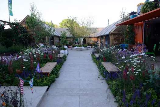 Wide path with engraved Golden Stone Porcelain leading to courtyard, designed by Ann-Marie Powell for RHS Chelsea 2016.