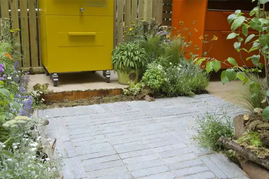 Antique Grey Limestone pavers in a garden kitchen setting with Charlie Charcoal Oven by Callum Corrie at RHS Chelsea.