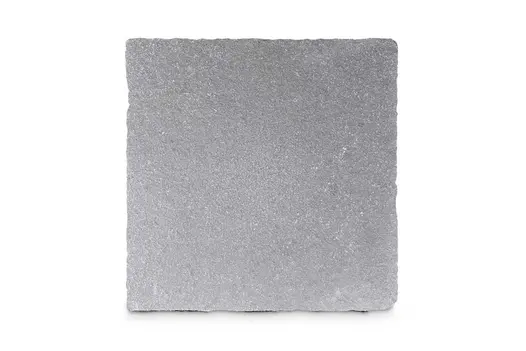 Close up rendered image of Antique Grey Limestone paving showing its natural texture and hand-cut edges, used for building steps.