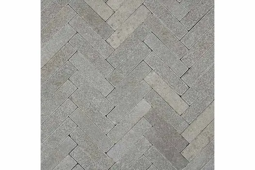 View directly down onto Antique Grey limestone patio bricks laid in herringbone pattern. Free UK next-day delivery available.