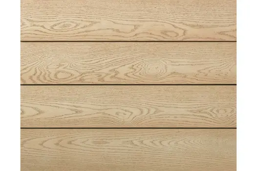 Overview of Ashwood Millboard composite decking installed in an outdoor space, highlighting soft tones and wood-effect texture.