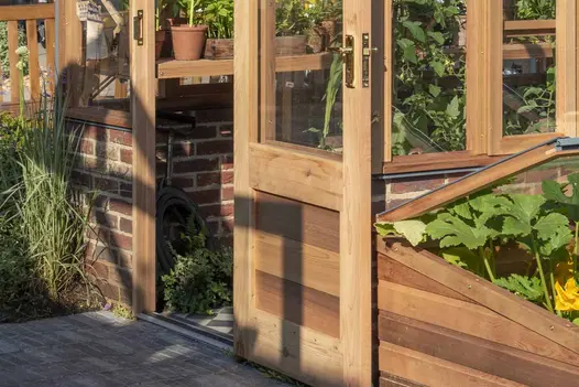 At RHS Chelsea Flower show 2024, Old English Facing Bricks used to create planting house, paved with basalt porcelain.
