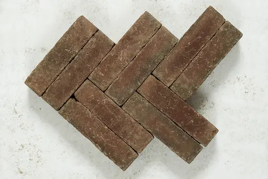 10 Derby clay pavers laid in double herringbone pattern against white background, showing light and dark brown tones.