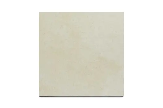 A single Mint porcelain paving slab captured from above, highlighting its textured surface and natural stone-inspired markings.