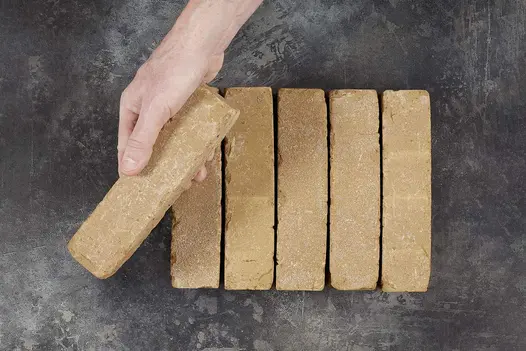 Golden Buff Clay Pavers being laid by hand, showing texture and proportion.
