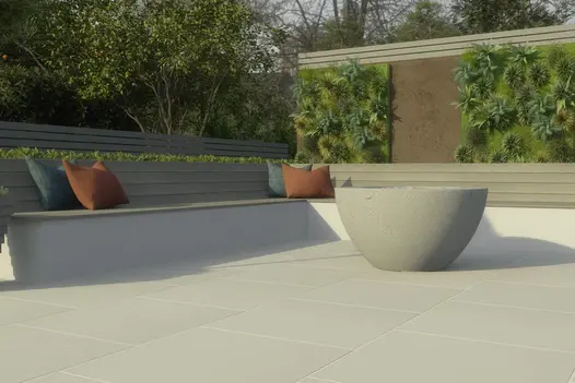 Vertical feature with DesignClad external cladding and living-wall overlooking patio paved with Comblanchien Porcelain Paving.