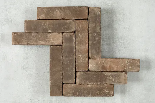 10 Verona clay pavers laid in a herringbone pattern against a light background. Free UK delivery available.