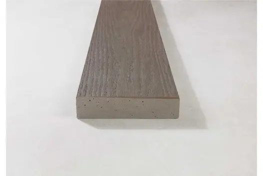 Single board of Ebony Grey Millboard on neutral background highlighting enhanced grain.