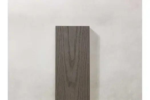 Overhead view of Ebony Grey Millboard decking board with consistent dark grey tone.