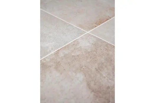 Gea vitrified porcelain paving slabs laid and pointed with white Norcros patio grout, available online 24/7 from London Stone.