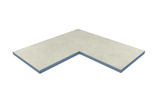 Corner coping in Grey Yorkstone Porcelain with rounded front edge. Offers subtle shape and soft visual appeal.