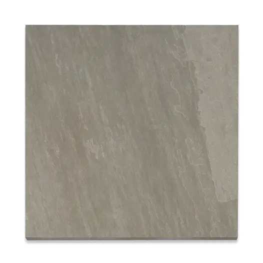 Single Kandla Grey porcelain paving slab, viewed from above, showing texture and markings including imitation riven surface.