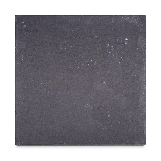 1 Midnight Black limestone patio slab, seen from above, showing dark consistent colour and texture. Free UK delivery available.