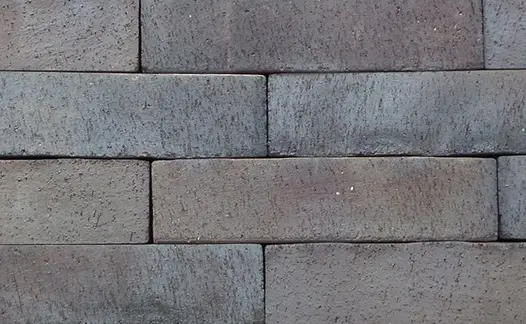 Close-up of Chelsea clay pavers laid butt jointed without sand, showing grey and pink shades of colour. Free UK delivery available.