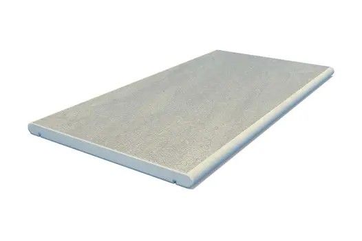 Single Raj Green porcelain straight coping stone, with drip-line and 20mm bullnose edge profile applied to the long sides.