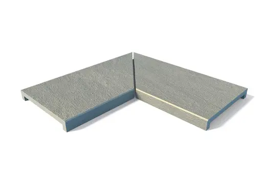 Raj Green corner coping stones, left and right hand pieces fitted together at mitred edges, with 40mm downstand made in-house. 