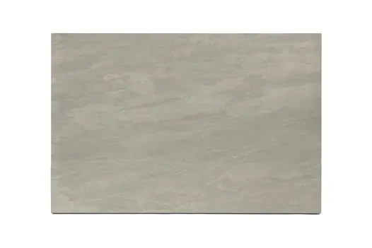 Single mid-tone Raj Green porcelain coping stone with 5mm chamfered edges, seen from above, showing markings and colour.
