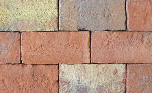Nine Romsey Antique belgian bricks shown in close up show off the clay pavers colour variations and texture.