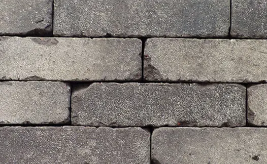 Close view of 4 courses of Silver Grey Multi clay pavers laid without sanded joints to show grey and white colour variation.