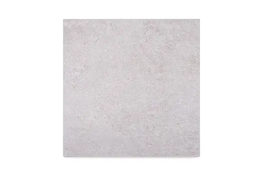 Silver-grey porcelain paving slab, viewed from above, showing texture and colour, available across the UK from London Stone.