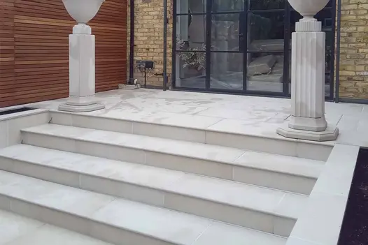 Close-up of Venetian Beige Porcelain 20mm Bullnose Step, highlighting its pale beige tones and clean, modern finish.