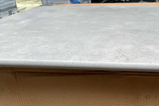 Close up of the bullnose on a single Venetian Grey 20mm Moulded off the shelf Step, showing texture.
