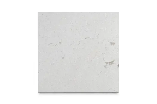 Single Vicenza Beige sandblasted limestone slab seen from above, showing the  the pavings surface texture and markings. Bespoke sizes available.