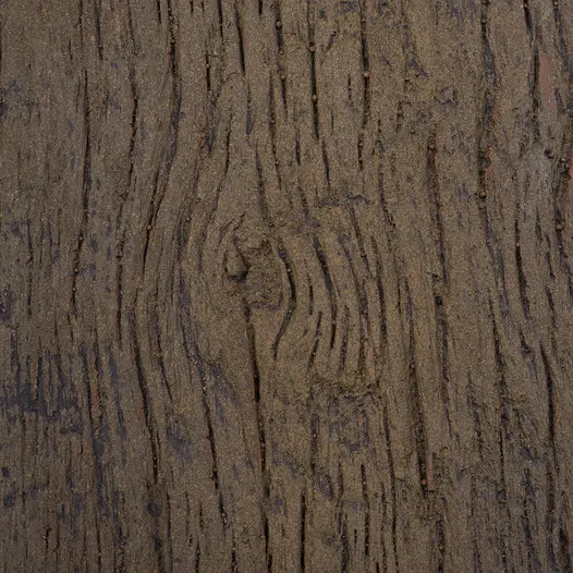 Detailed swatch of Vintage Millboard Decking, showcasing the rich texture and authentic weathered look of the hand-picked moulded boards.
