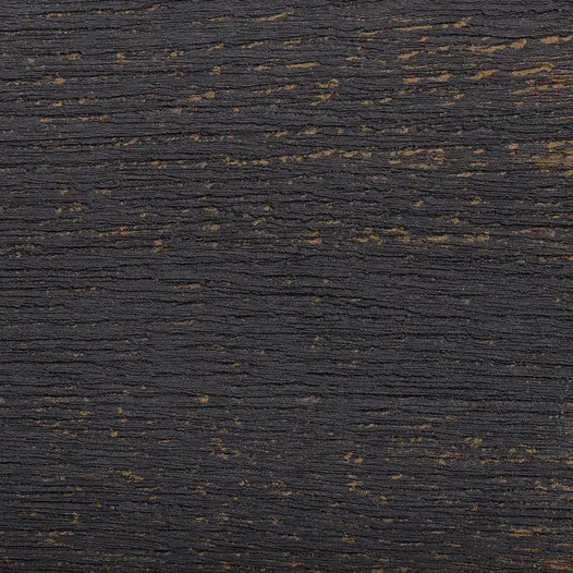 Close-up of square of Burnt Cedar Millboard composite decking, showing black and brown tones and brushed texture.